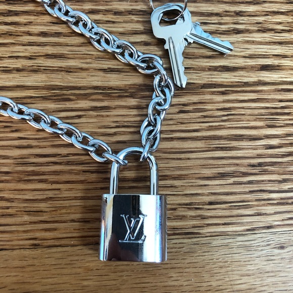 Louis Vuitton Jewelry - authentic Louis Vuitton lock necklace